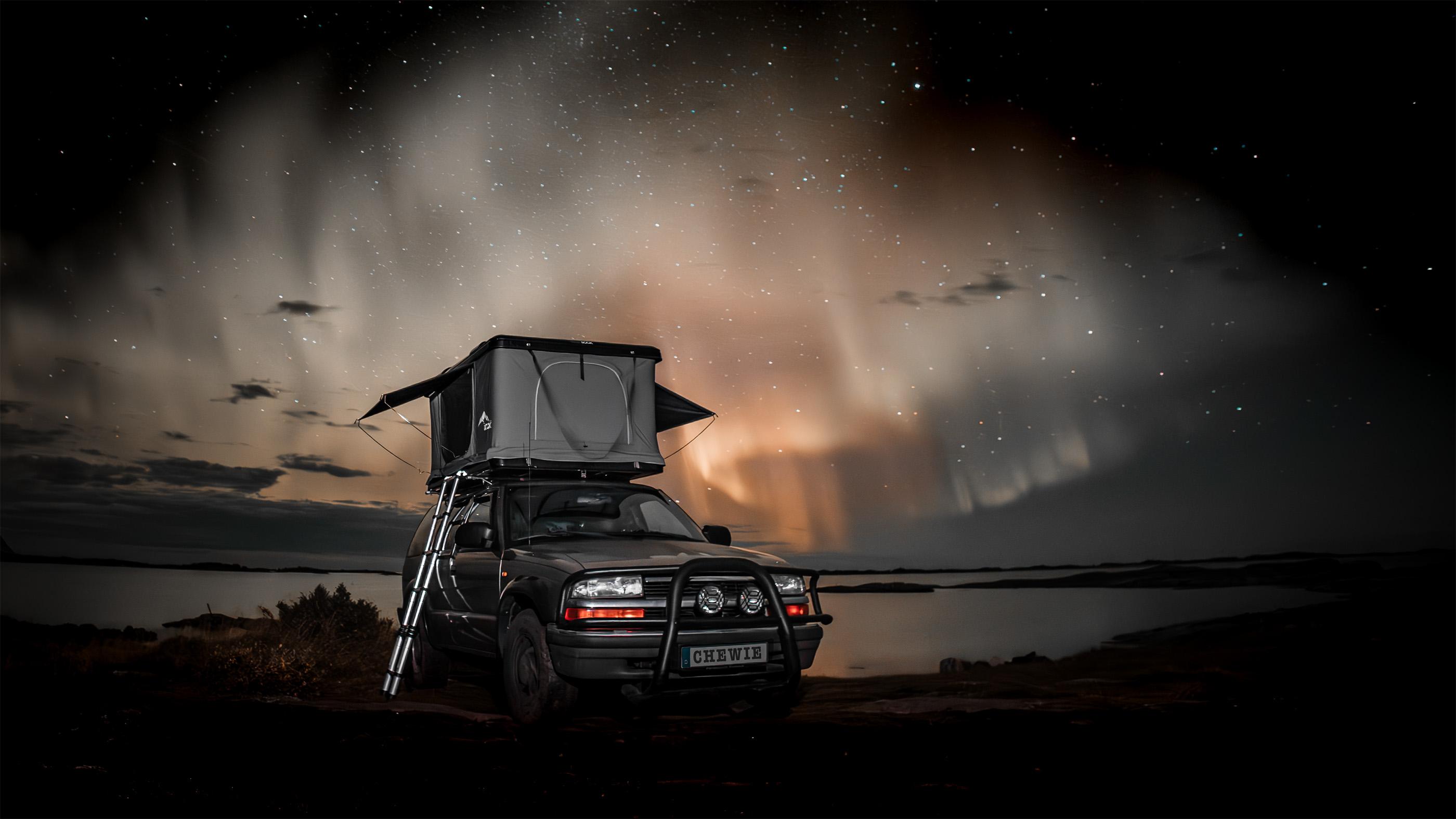 My overlanding rig Chewie under the northern lights in Norway – capturing the magic of adventure.