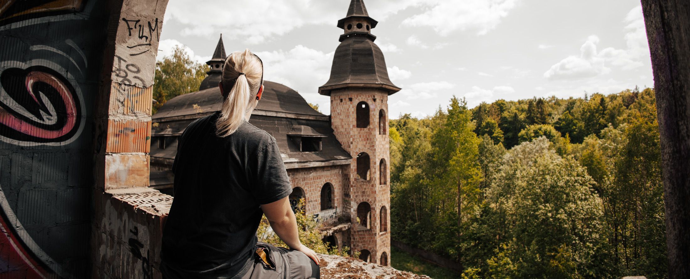 Anne exploring a lost place where someone dreamed big but had no resilience to fullfil their vision.