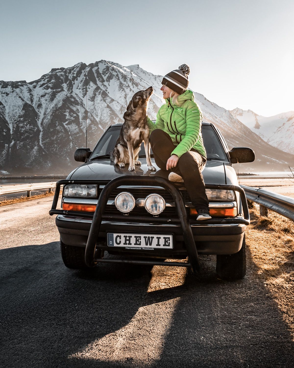 Resilient AppSec systems built from the road - here on Lofoten island in northern Norway. Anne, her dog Suschka and her old Chevy Blazer in winter on Lofoten island, Northern Norway.