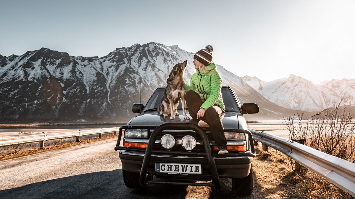Resilient AppSec systems built from the road - here on Lofoten island in northern Norway. Anne, her dog Suschka and her old Chevy Blazer in winter on Lofoten island, Northern Norway.