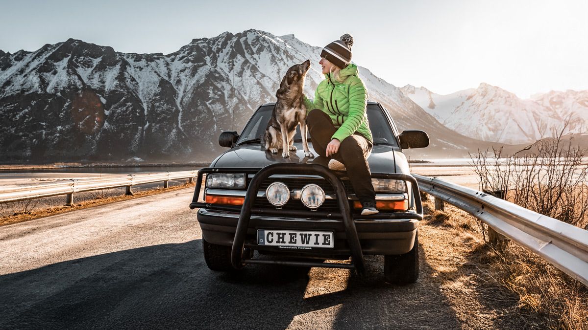 Resilient AppSec systems built from the road - here on Lofoten island in northern Norway. Anne, her dog Suschka and her old Chevy Blazer in winter on Lofoten island, Northern Norway.