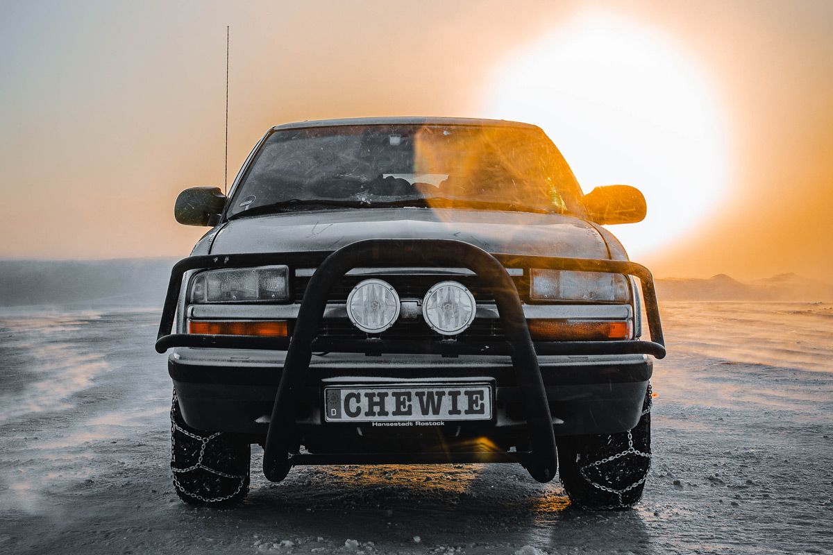 Resilience built in the arctic winter 1999 Chevy Blazer at the North Cape in winter, symbolizing independence, resilience, and the ability to keep moving in harsh conditions.