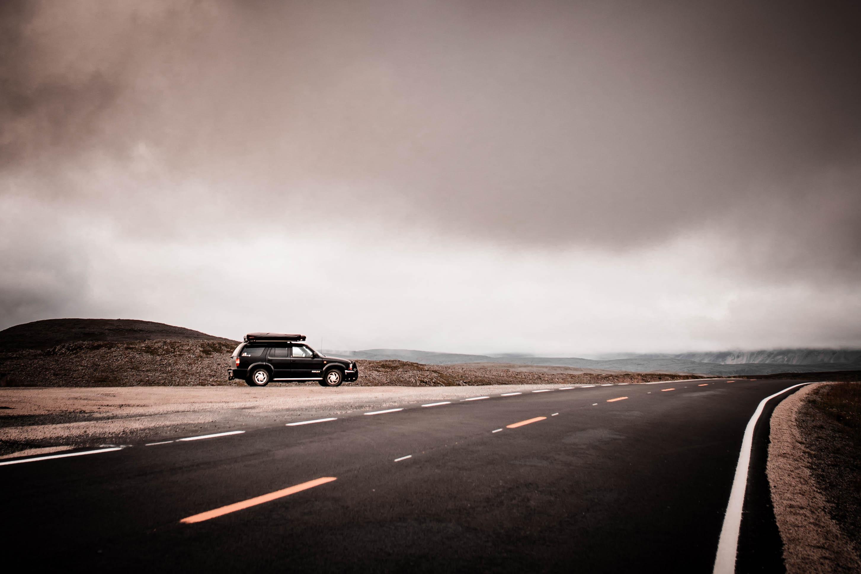 Resilience is built where comfort ends. Facing the open road in northern Norway – AppSec expert practicing real-world resilience.